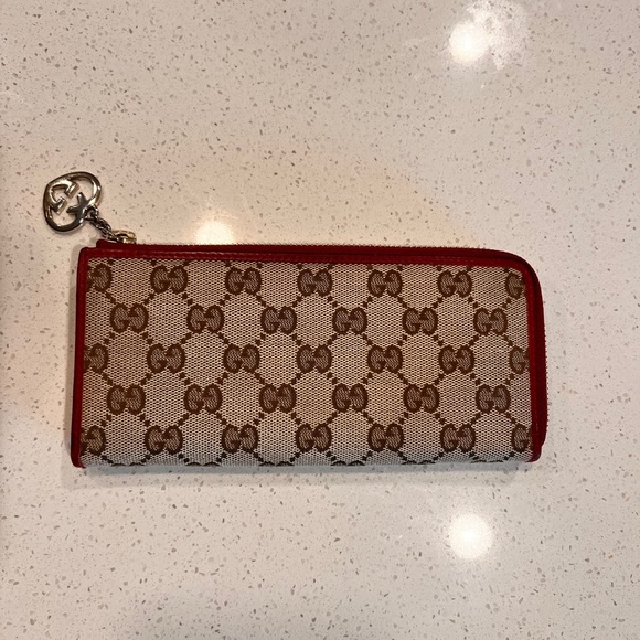 Authentic Gucci Beige/Red GG Canvas Zip Around
Wallet - Picture 1 of 9